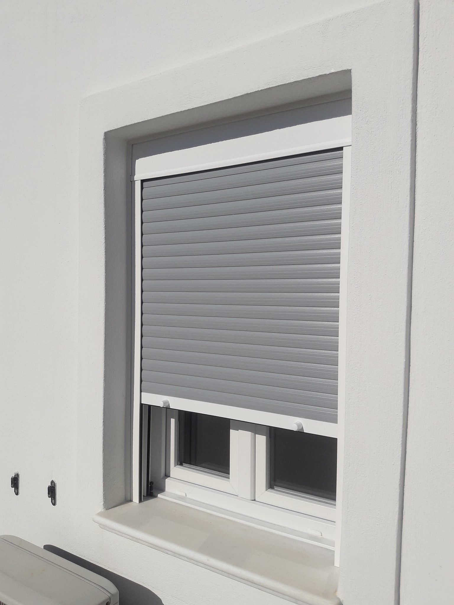Exterior window roller shutter in a grey finish
